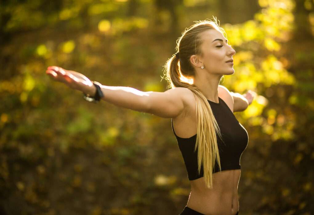 pretty sport woman doing yoga exercises park 1 merabharattimes